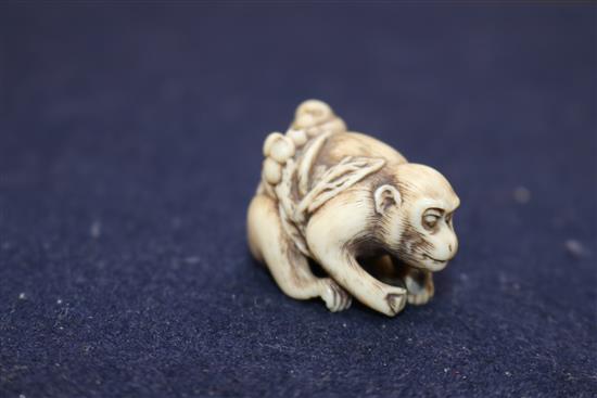 A 19th century Japanese ivory monkey group netsuke